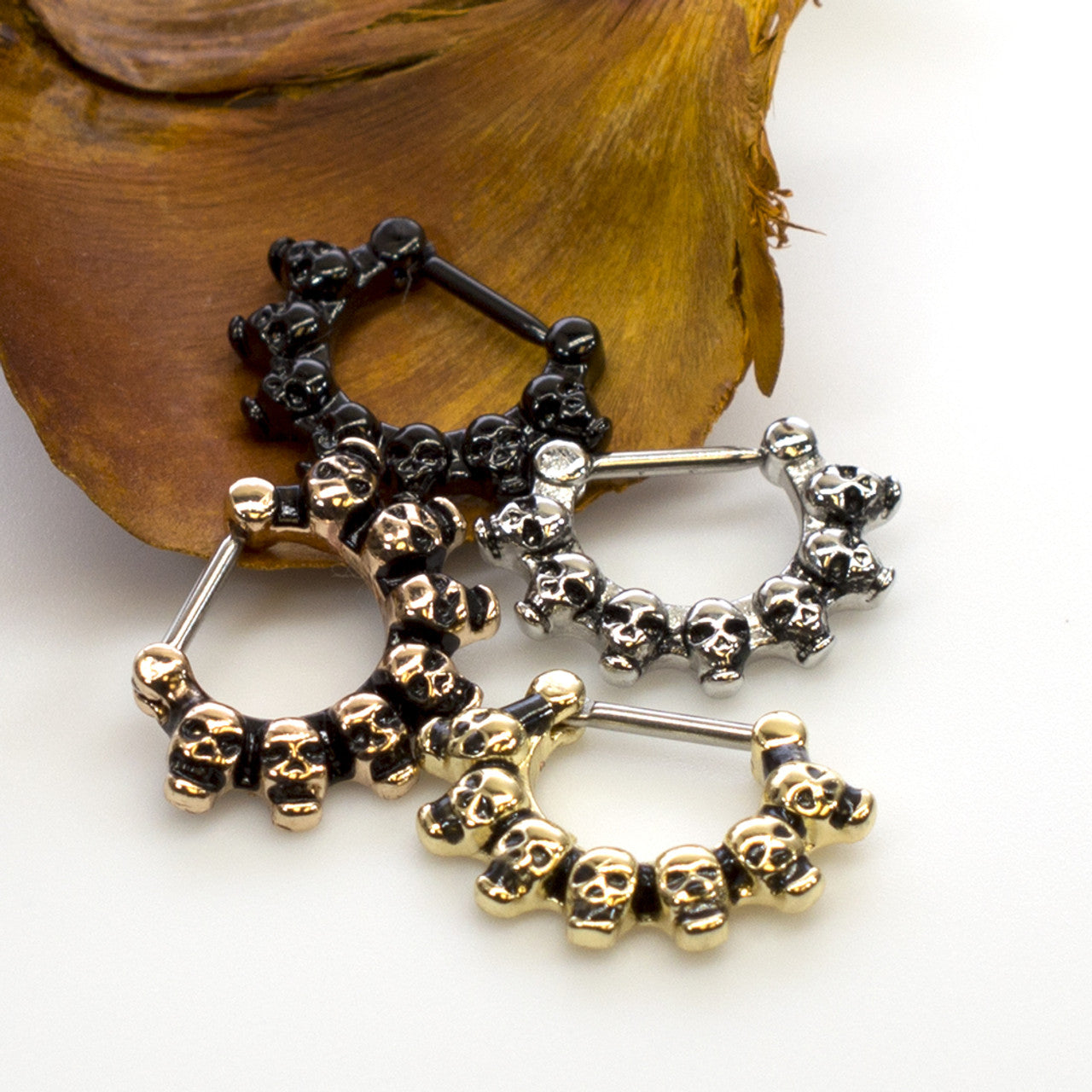Surgical Steel Septum Clicker Ring 16 Gauge With Lined Skulls
