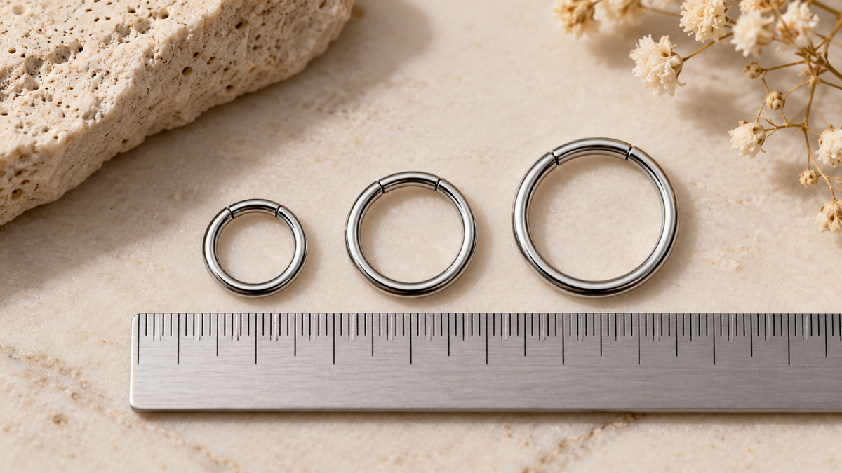 AI illustration of three ring sizes beside a ruler; not a measuring reference
