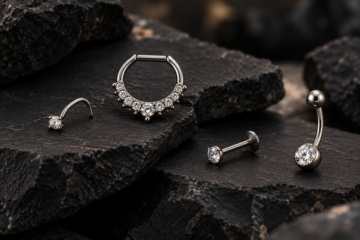 AI illustration of assorted body jewelry on black stone