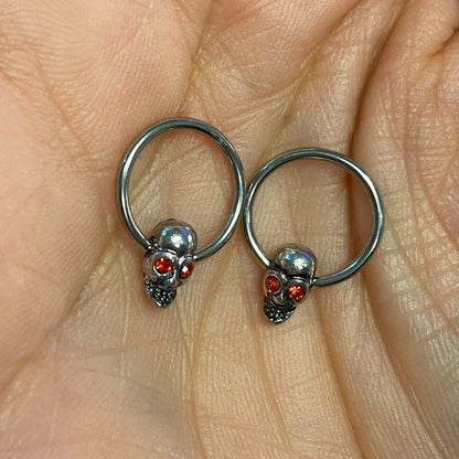 Surgical Steel Captive Bead Ring 16 Gauge Horseshoe With Skull - Pair