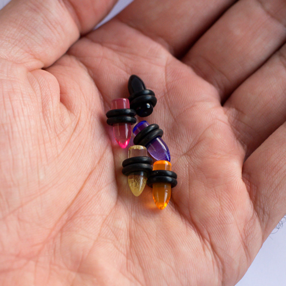 Acrylic 4 Gauge UV Glow Bullet Ear Plugs - Pair - photo 3