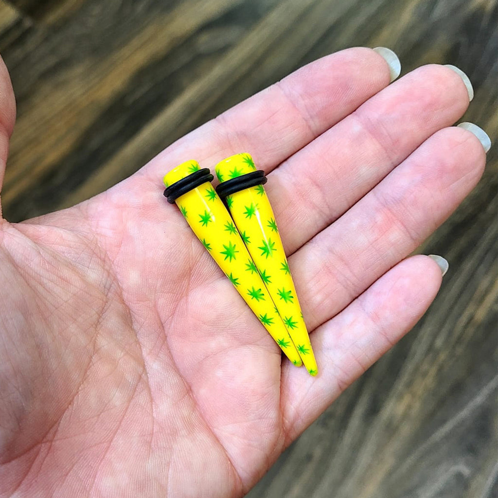 Acrylic 6G to 1/2" Pot Leaf Yellow Ear Tapers Stretching Kit - 12 Pack